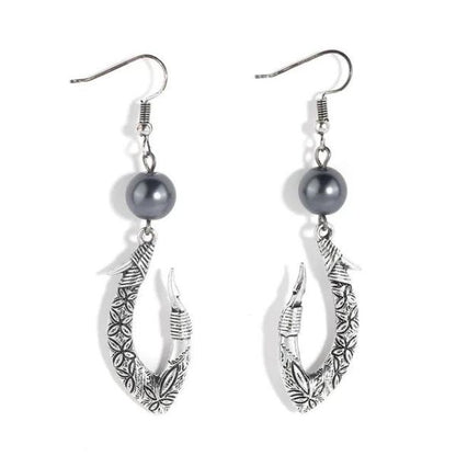 Boucles d'oreilles Hei Matau Maori :  Patrimoine et Traditions de la Nouvelle-Zélande et des Îles Polynésiennes
