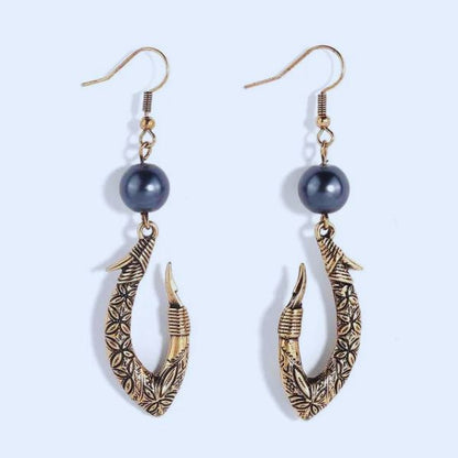 Boucles d'oreilles Hei Matau Maori :  Patrimoine et Traditions de la Nouvelle-Zélande et des Îles Polynésiennes