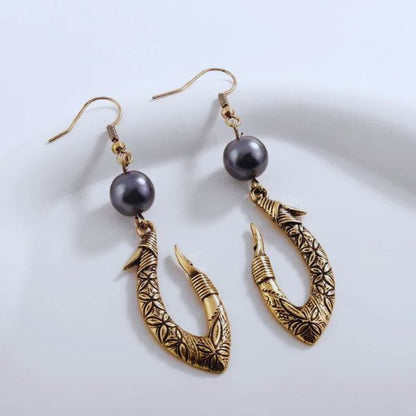 Boucles d'oreilles Hei Matau Maori :  Patrimoine et Traditions de la Nouvelle-Zélande et des Îles Polynésiennes