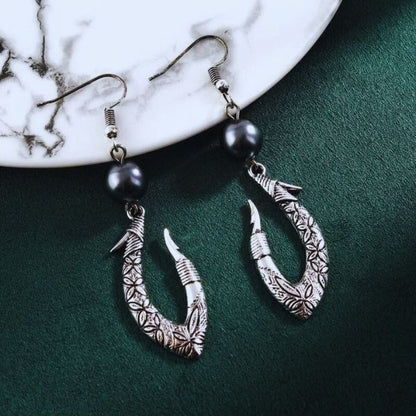 Boucles d'oreilles Hei Matau Maori :  Patrimoine et Traditions de la Nouvelle-Zélande et des Îles Polynésiennes
