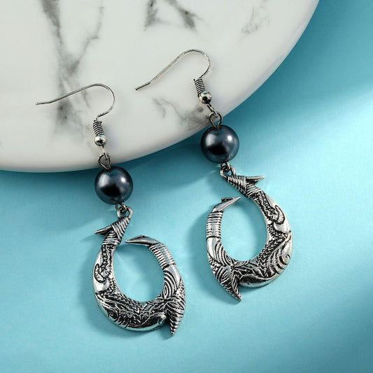 Boucles d'oreilles Hei Matau Maori : Les Trésors Culturels de la Nouvelle-Zélande et des Îles Polynésiennes (Copie)