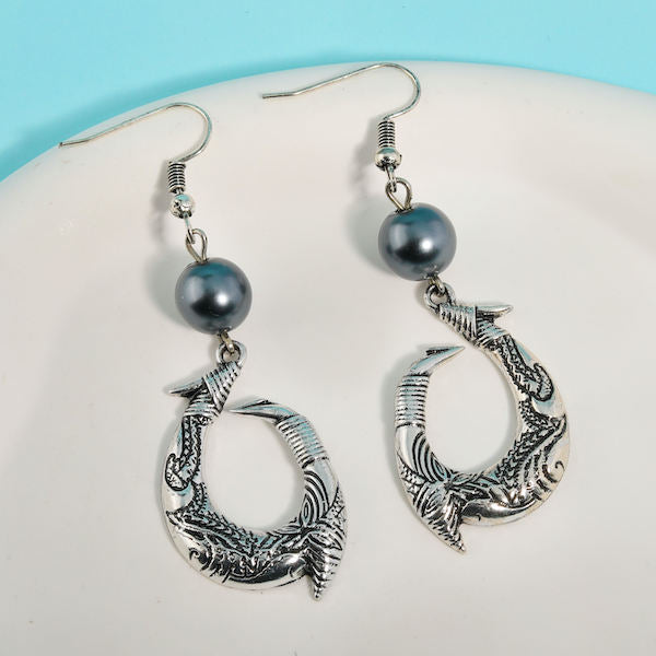 Boucles d'oreilles Hei Matau Maori : Les Trésors Culturels de la Nouvelle-Zélande et des Îles Polynésiennes (Copie)