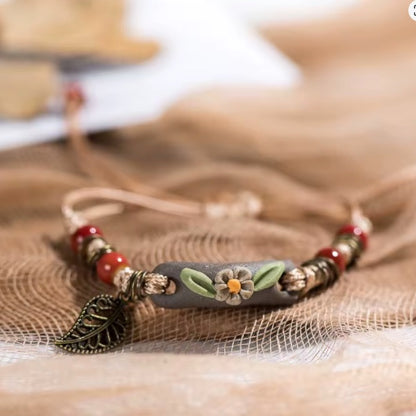 Bracelet Tissé à la Main – Perles en Céramique et Charme Moderne