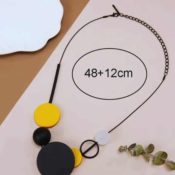 Collier Pendentif Tranche Ronde en bois noir naturel - Création Artisanale par Creatiz, Martinique